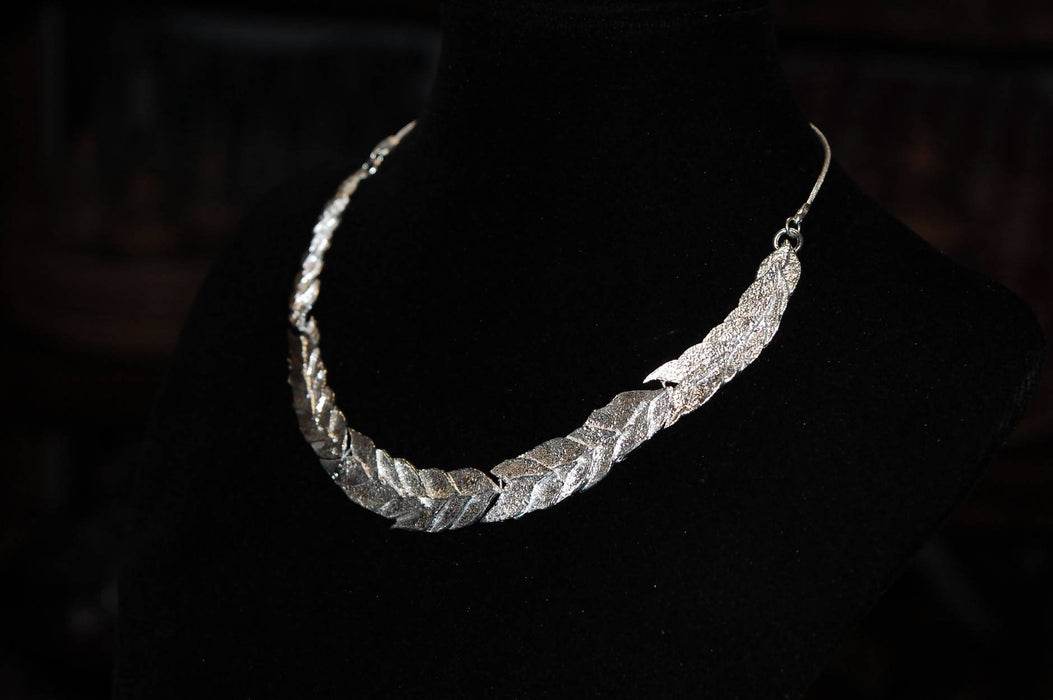 Sterling silver articulated leaf themed necklace