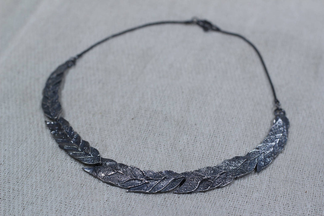 Sterling silver articulated leaf themed necklace