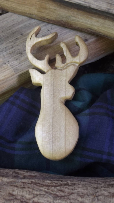 Hand carved Stag brooches
