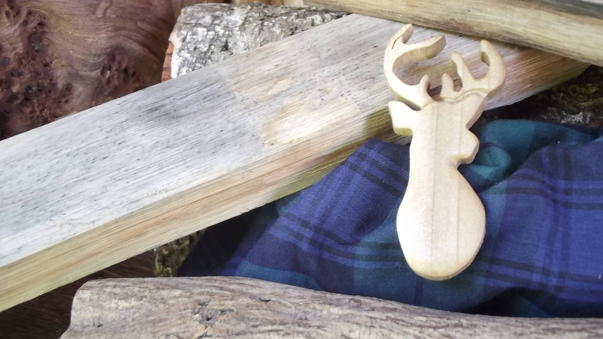Hand carved Stag brooches